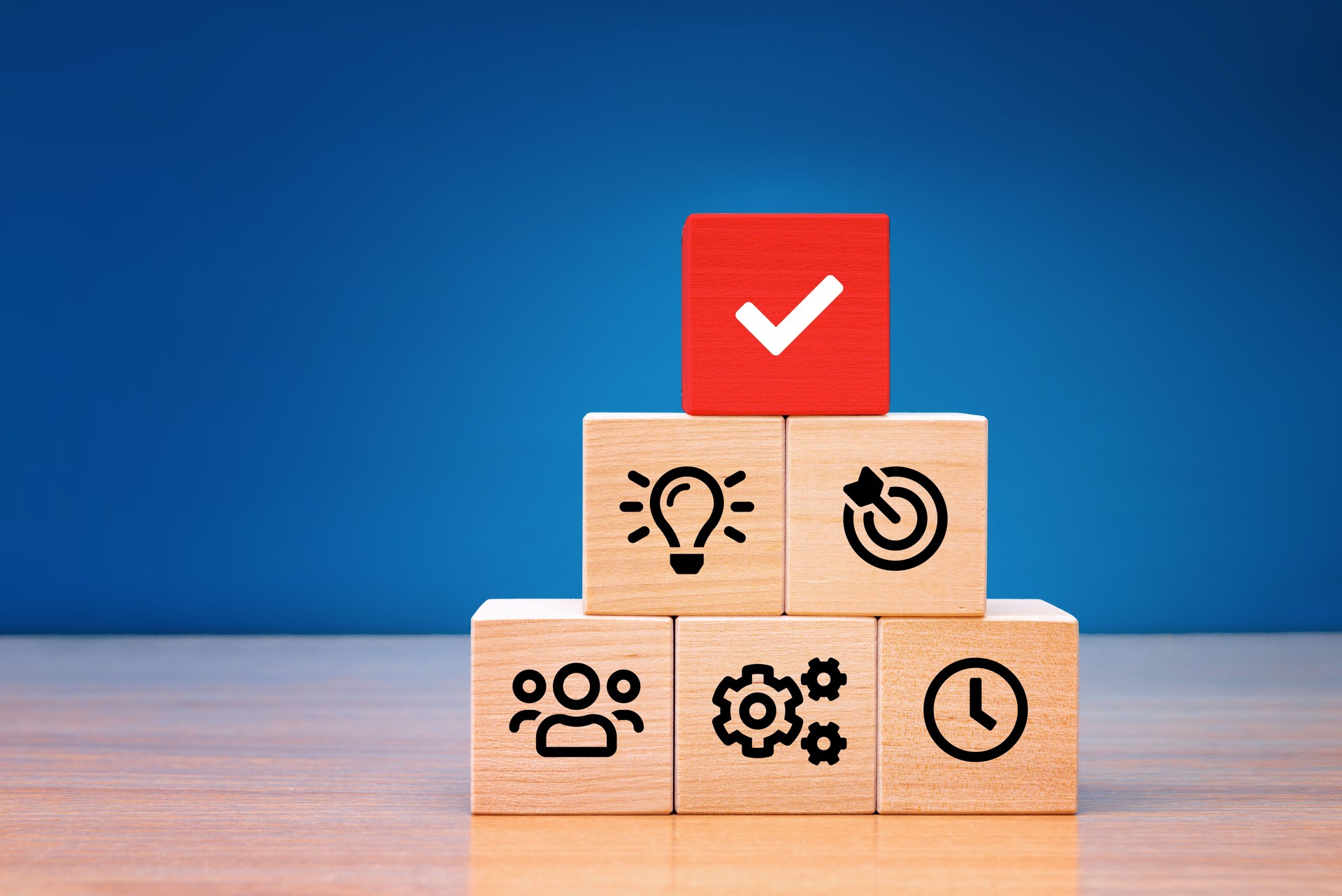 Business process management, Businessman plan a project with wooden cubes with icon business strategy on blue background.
